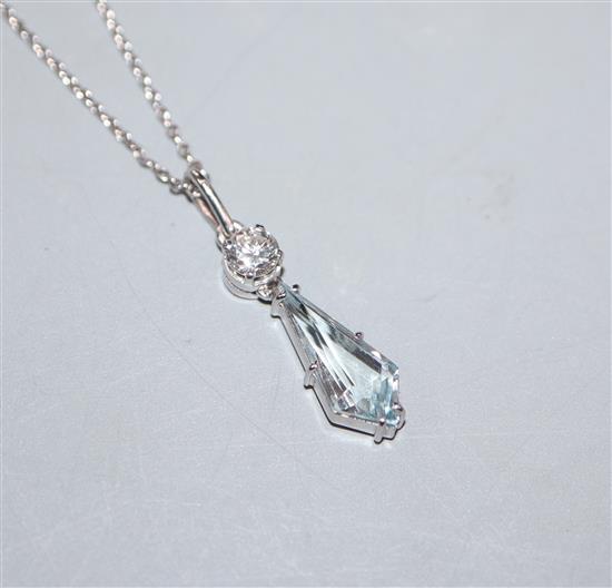 A modern Swedish 18ct white metal, diamond and shaped aquamarine set pendant, on a 750 fine link chain, pendant 19mm.